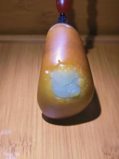 和田玉独籽:金包玉 长:60.2毫米,宽:33.7毫米,高24.1毫米,重